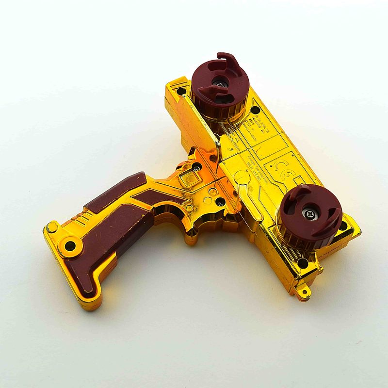 Gold Duotron Launcher, side view